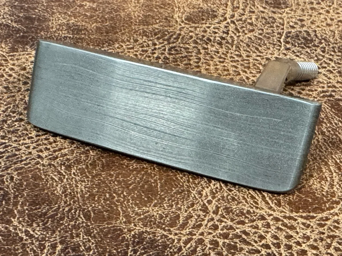 Wild hair and a block of Damascus. Not really shaped to resemble anything, but she'll probably go on a "Thin My Bumpers" — photo 3 of 5