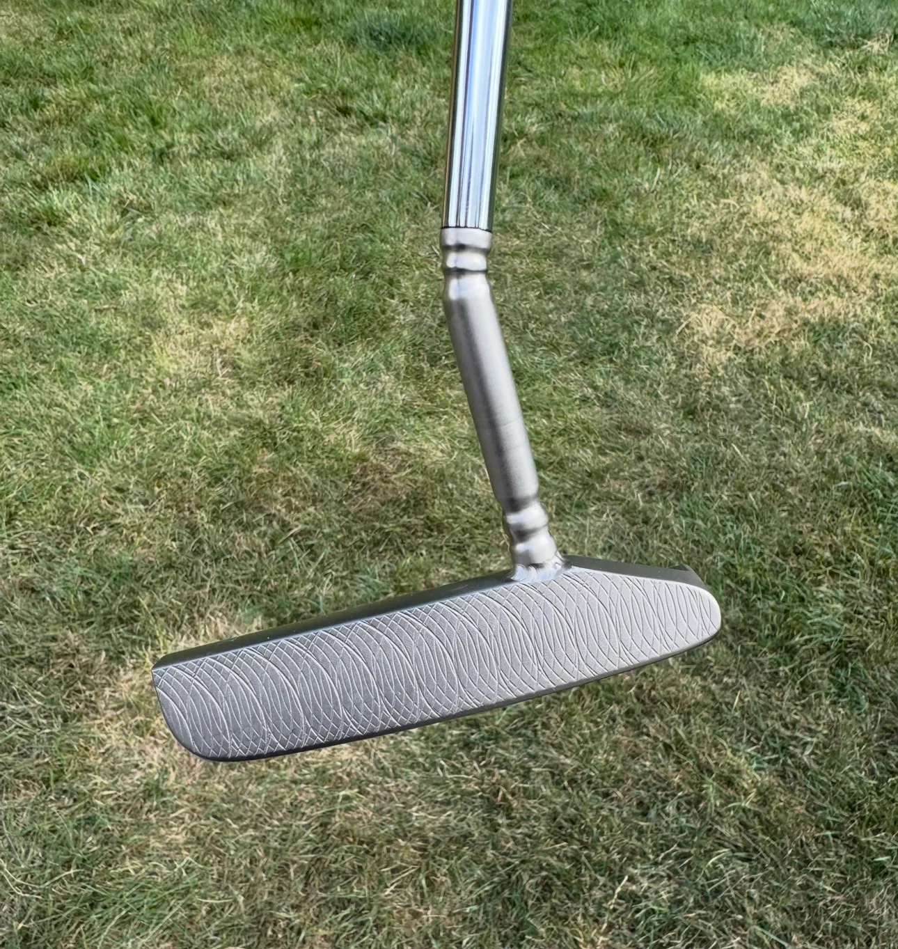 Last in my collection was also my first. I love the feel of the nickel plated carbon and the watcher stamping on the bot — photo 3 of 4