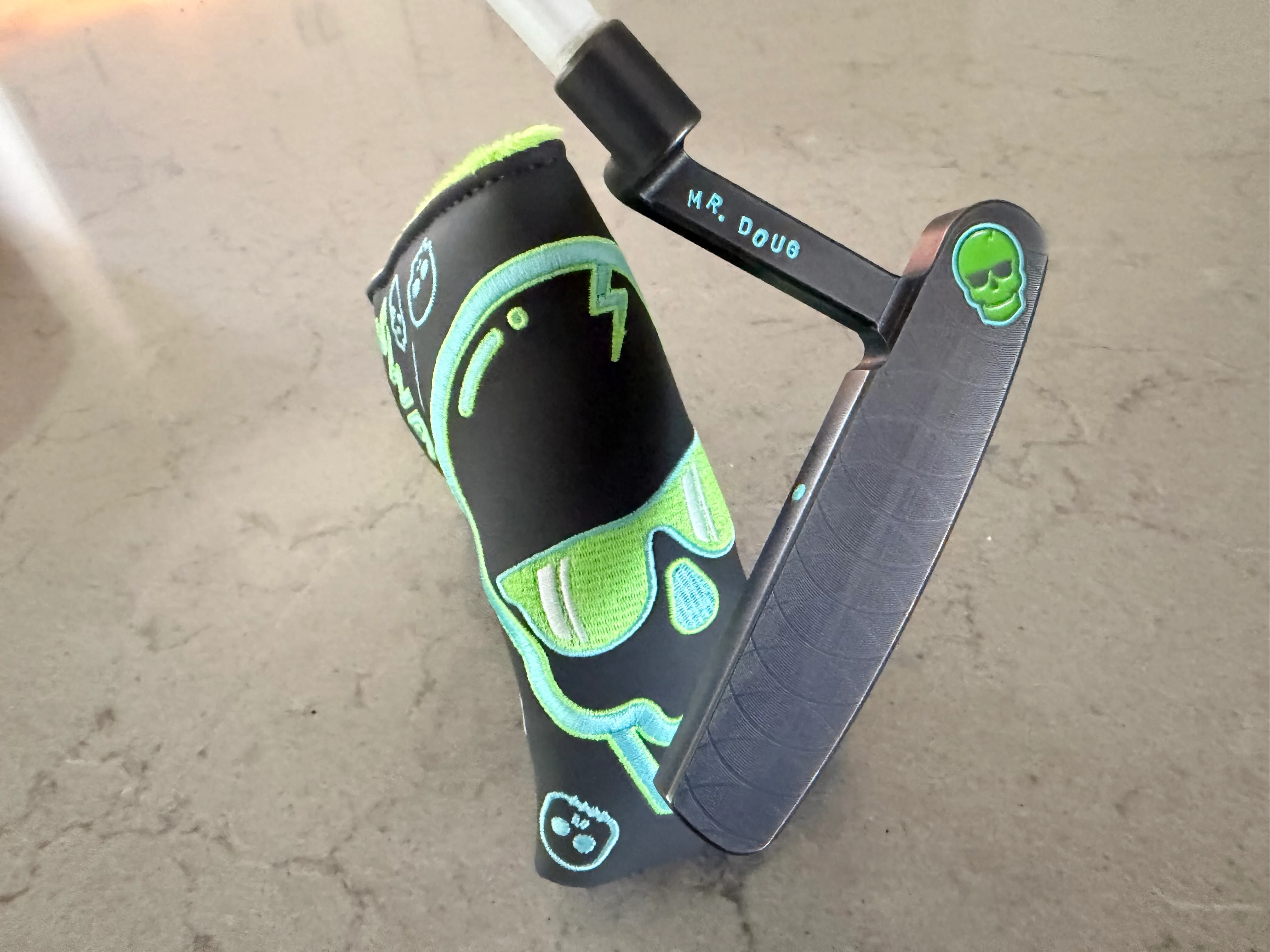 My gamer from when I worked at Swag. Putter came first, and then the colors looked cool together so a matching headcover — photo 3 of 4