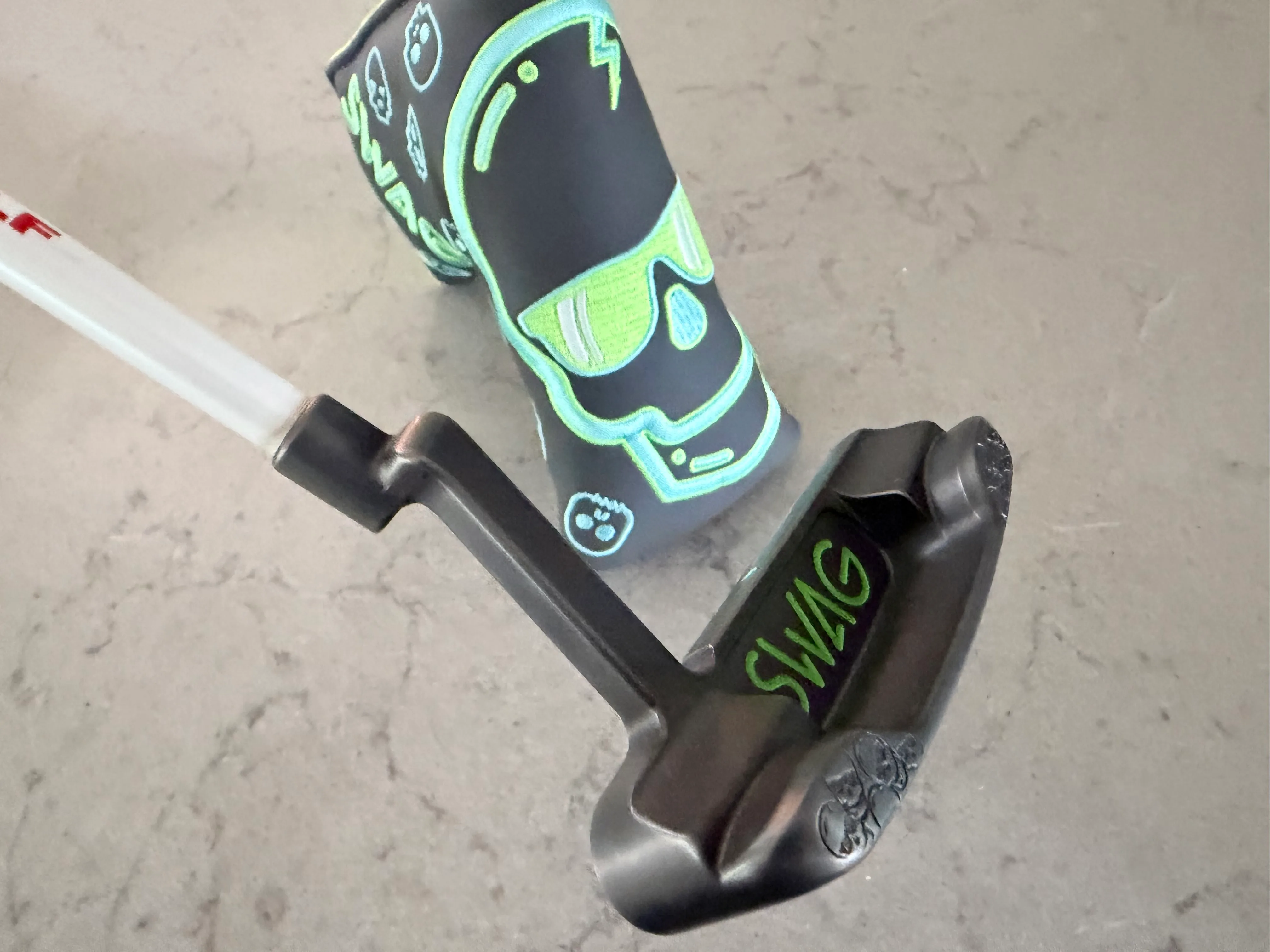 My gamer from when I worked at Swag. Putter came first, and then the colors looked cool together so a matching headcover — photo 2 of 4